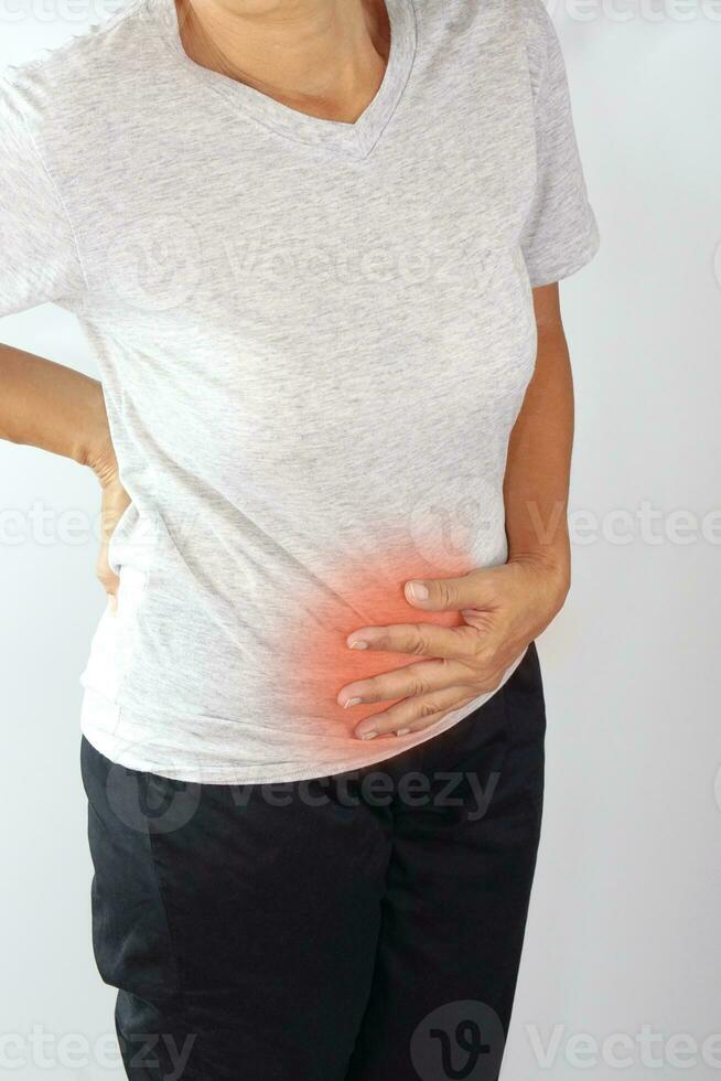 Woman suffering from stomachache. Chronic gastritis, menstruation and health concept. photo