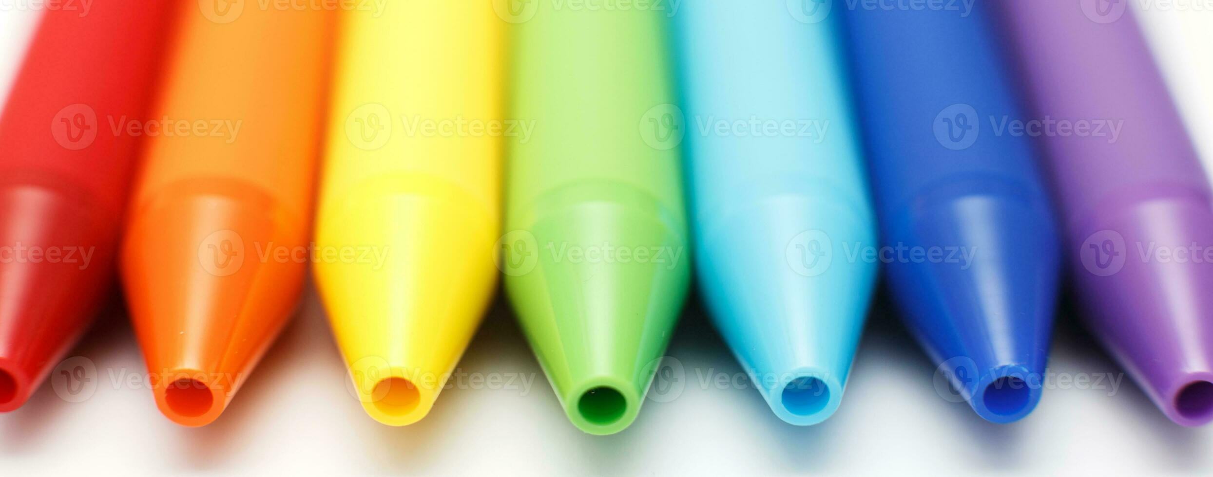 Multicolored gel pens isolated on a white background, close-up. Copy space. banner photo