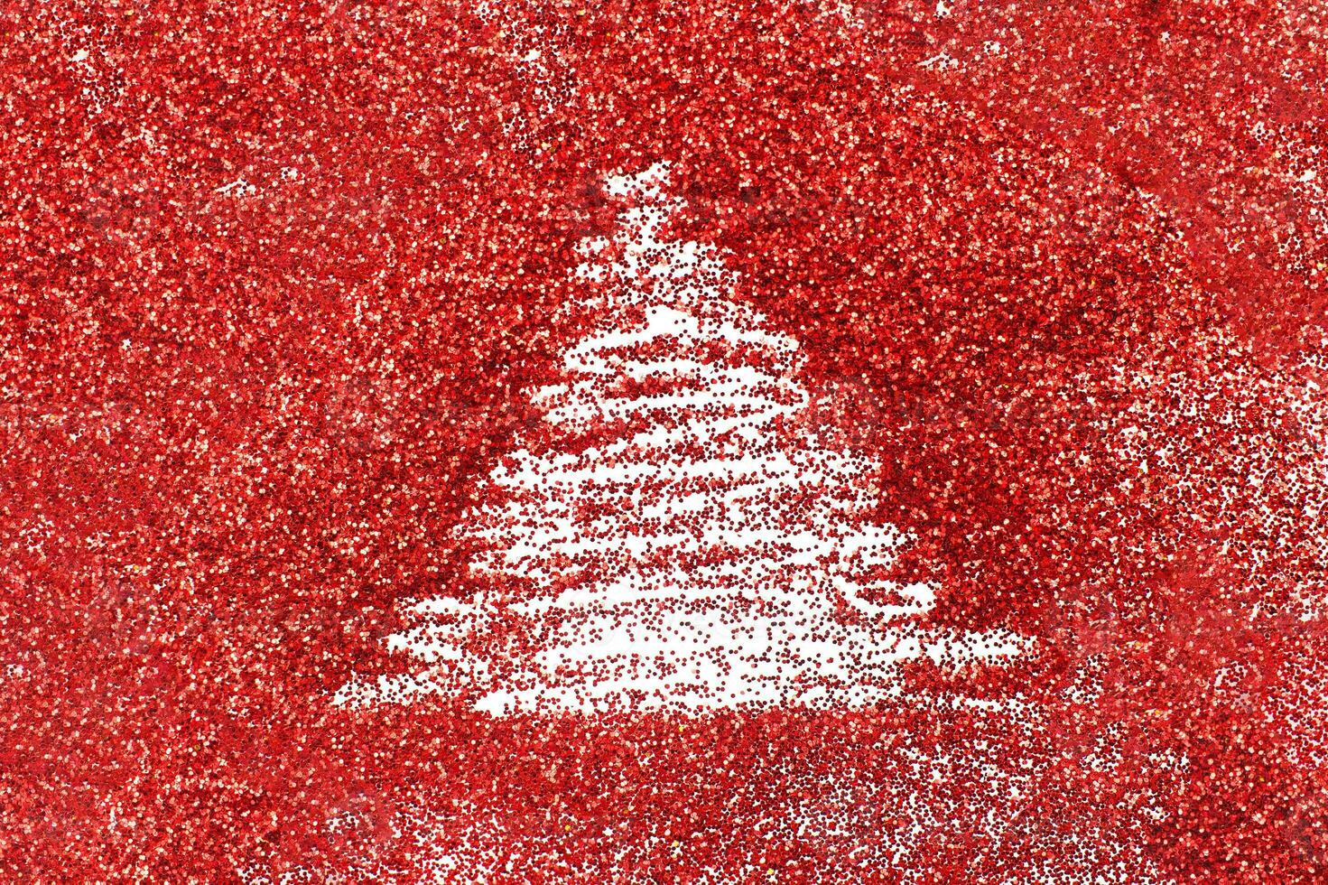 finger drawn christmas tree on shiny red confetti background 24202055