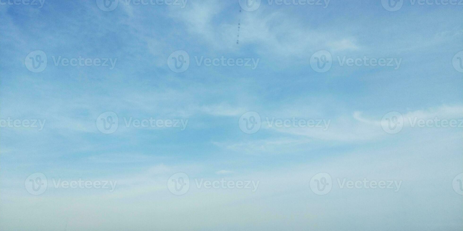 Blue sky with white clouds. Nature background. Copy space for text. photo