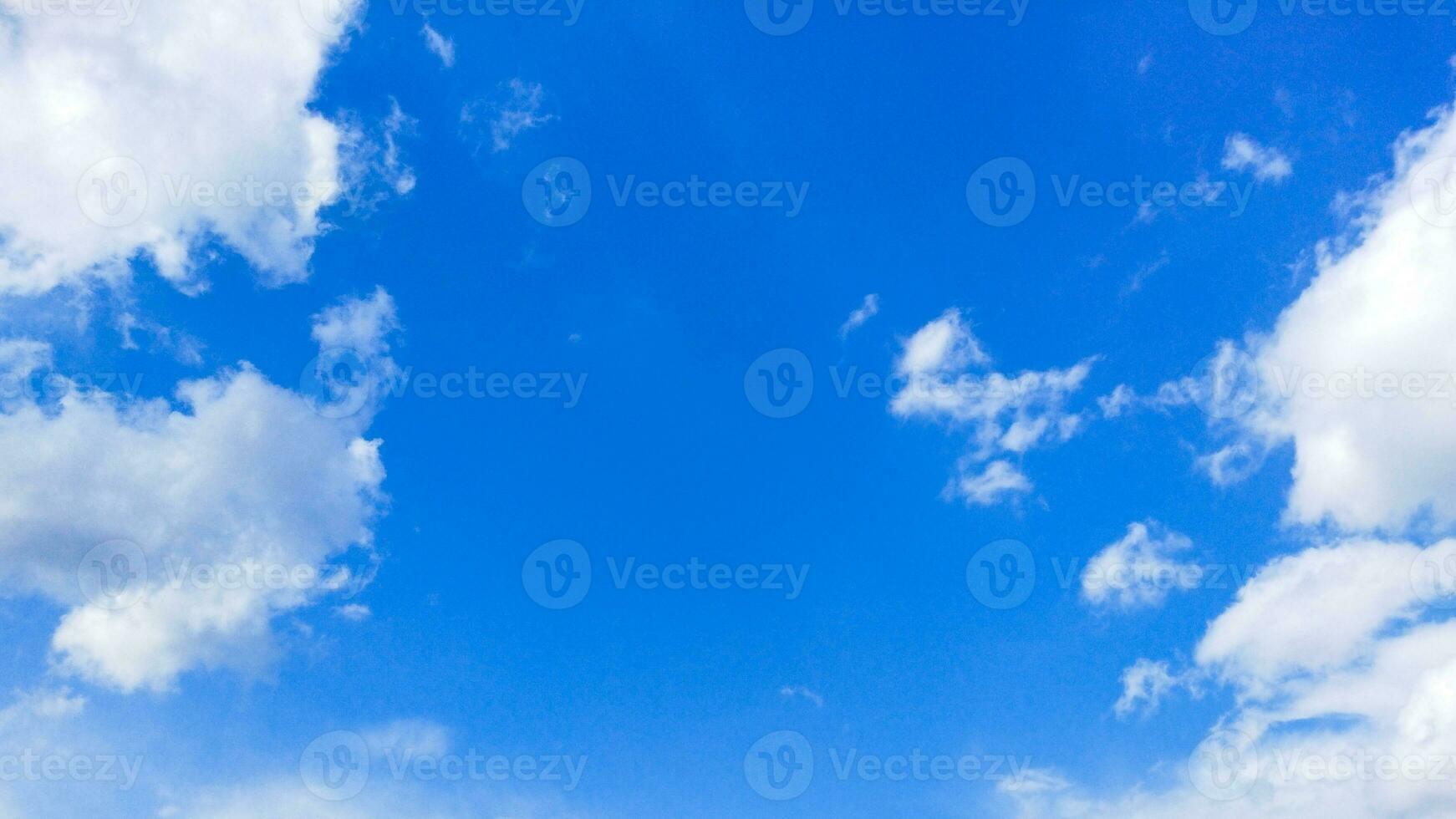 Blue sky with white clouds. Nature background. Copy space for text. photo