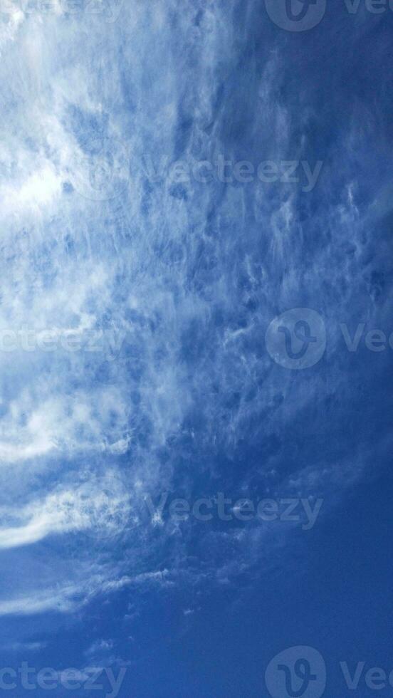 Blue sky with white clouds. Nature background. Copy space for text. photo