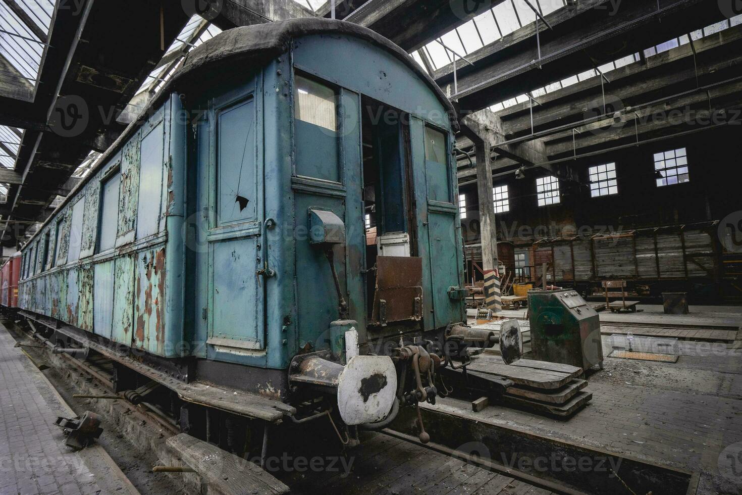 Old warehouse with abandoned trains somewhere in Belgium, Urbex. photo