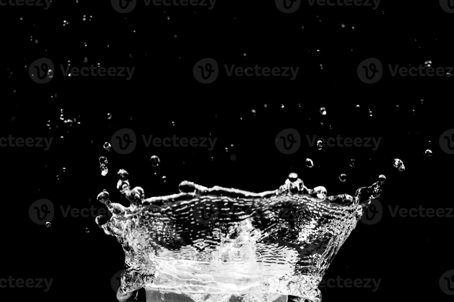 water splash on black background for decorating projects photo