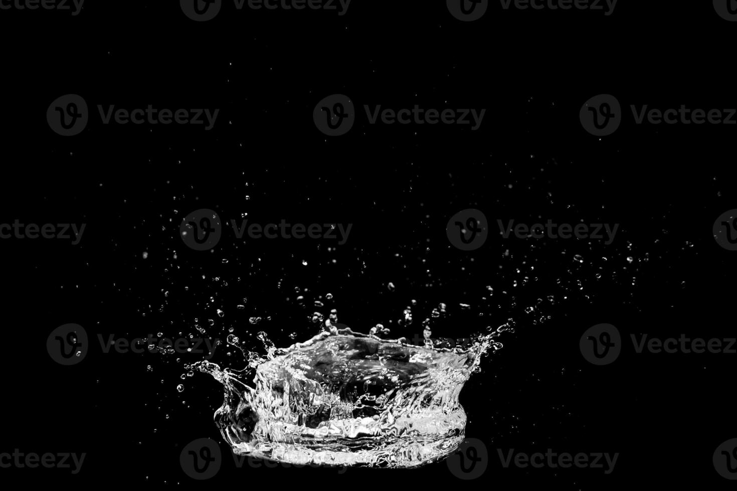 water splash on black background for decorating projects photo