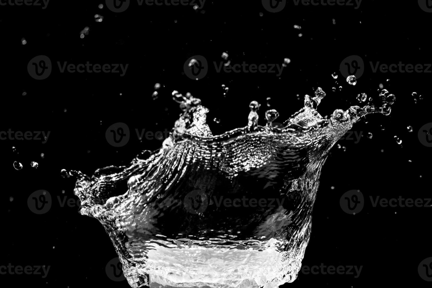 water splash on black background for decorating projects photo