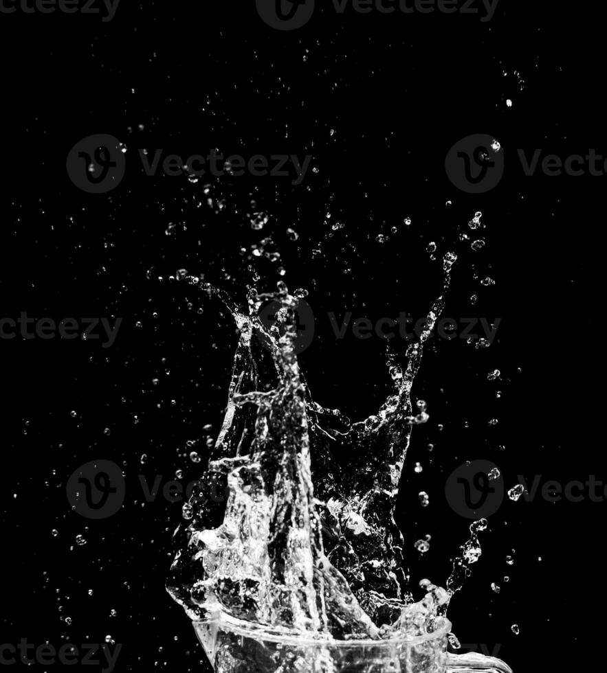 water splash on black background for decorating projects photo