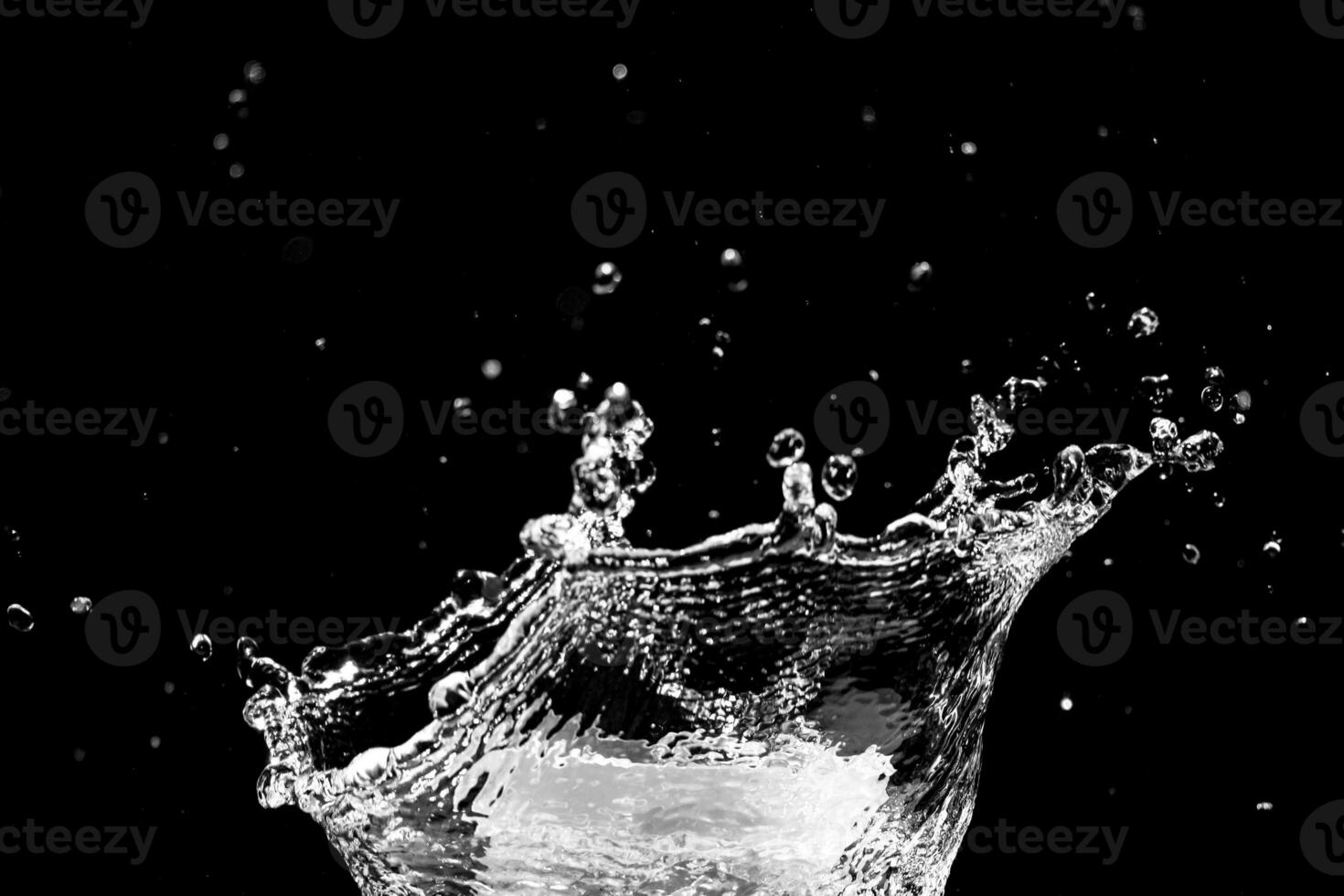 water splash on black background for decorating projects photo