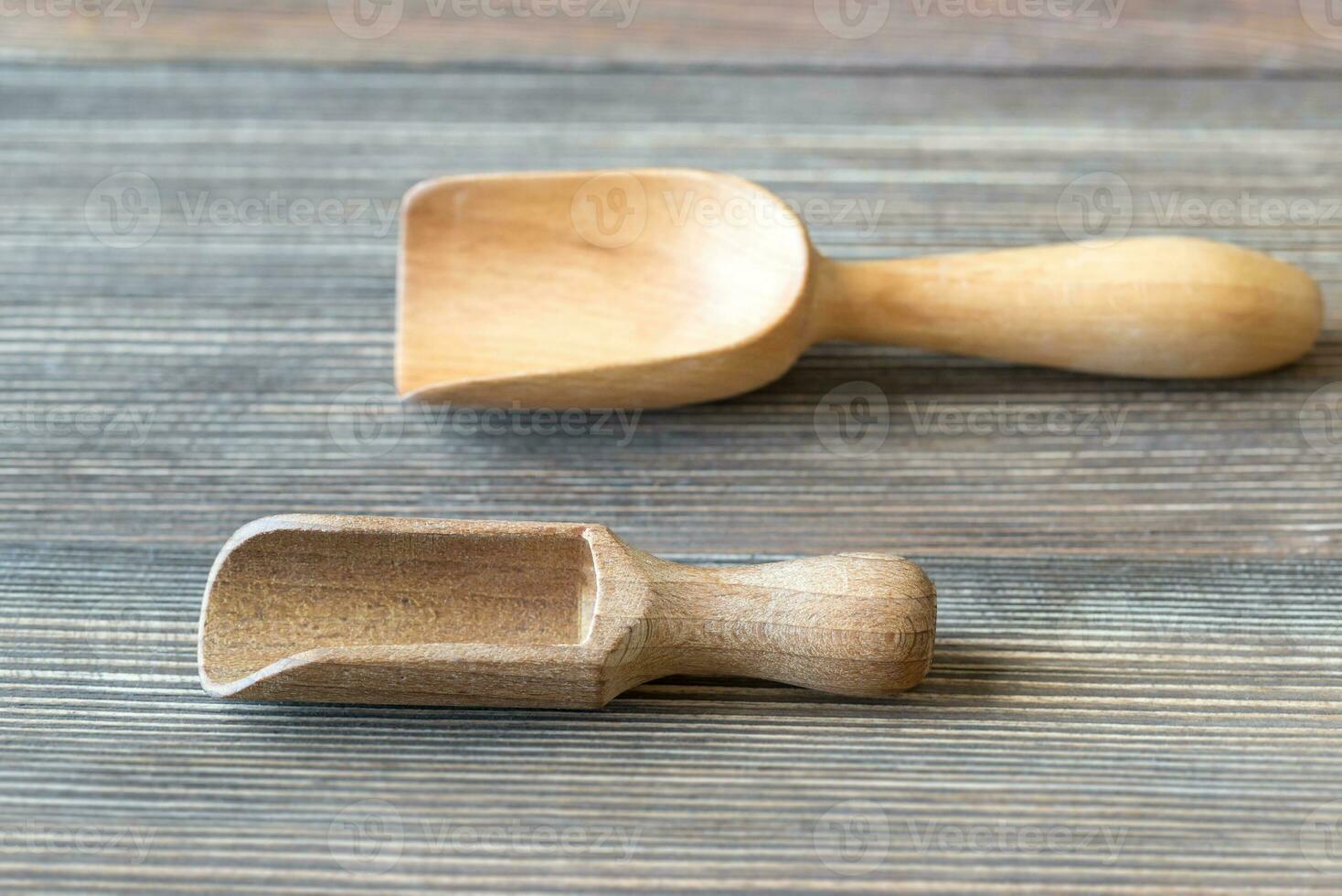 Two scoops on the wooden table photo