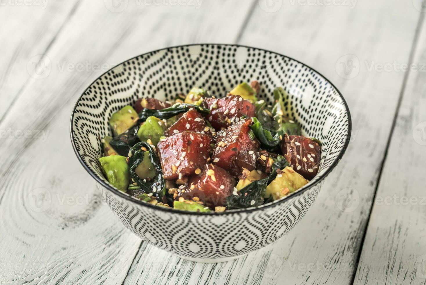 Bowl of poke - traditional Hawaiian dish photo