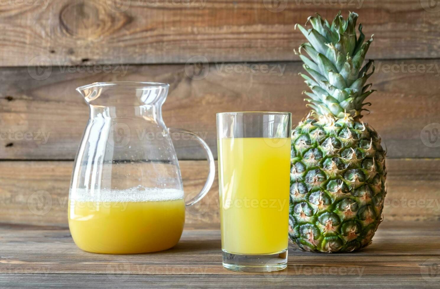 Glass of pineapple juice photo