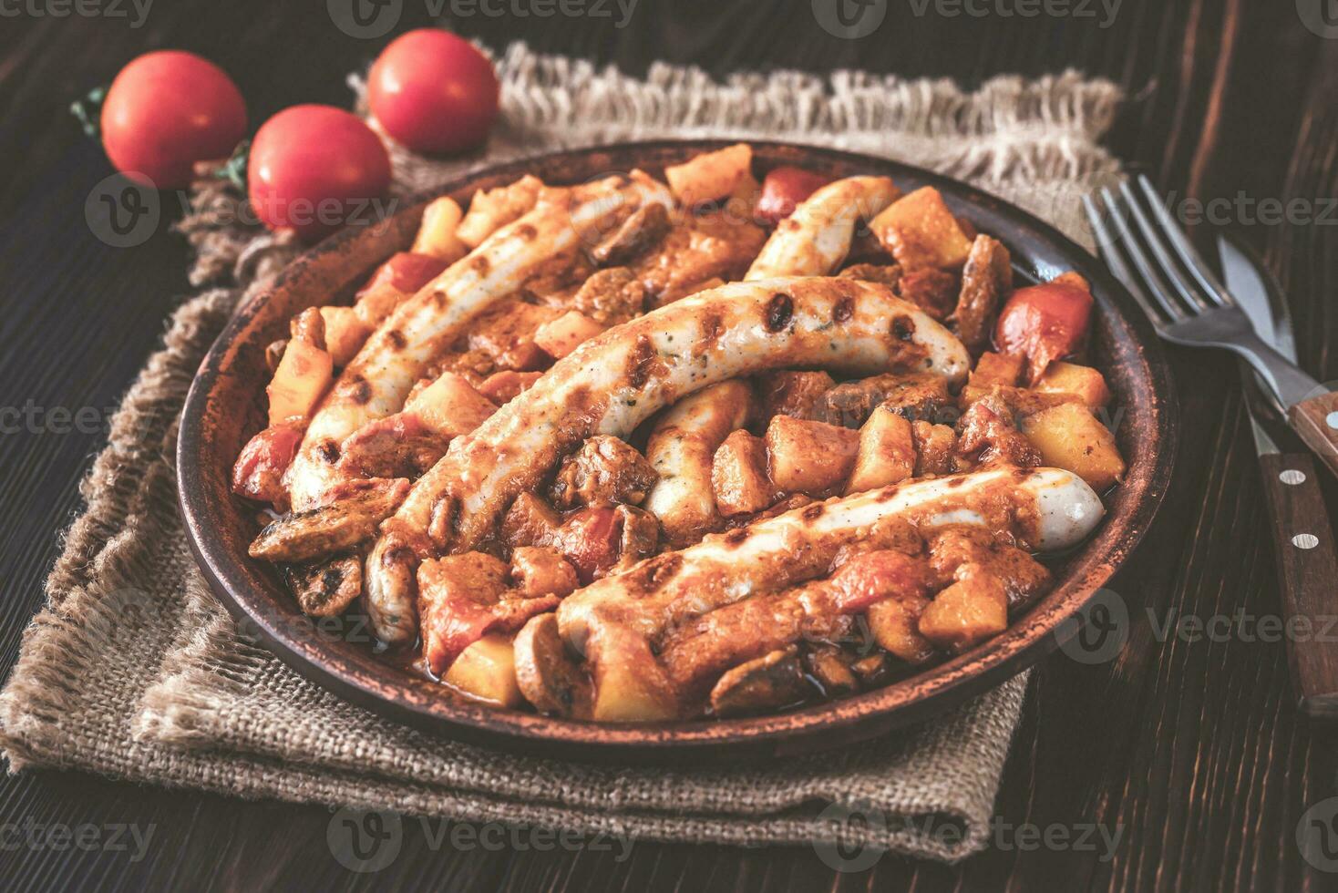 Thai red curry with sausages photo
