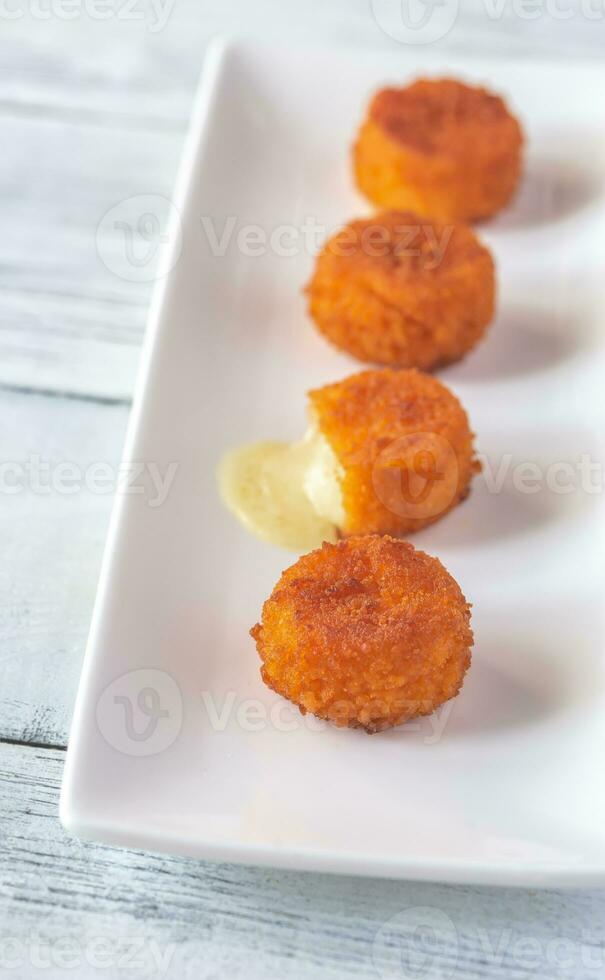 Camembert nuggets raw photo