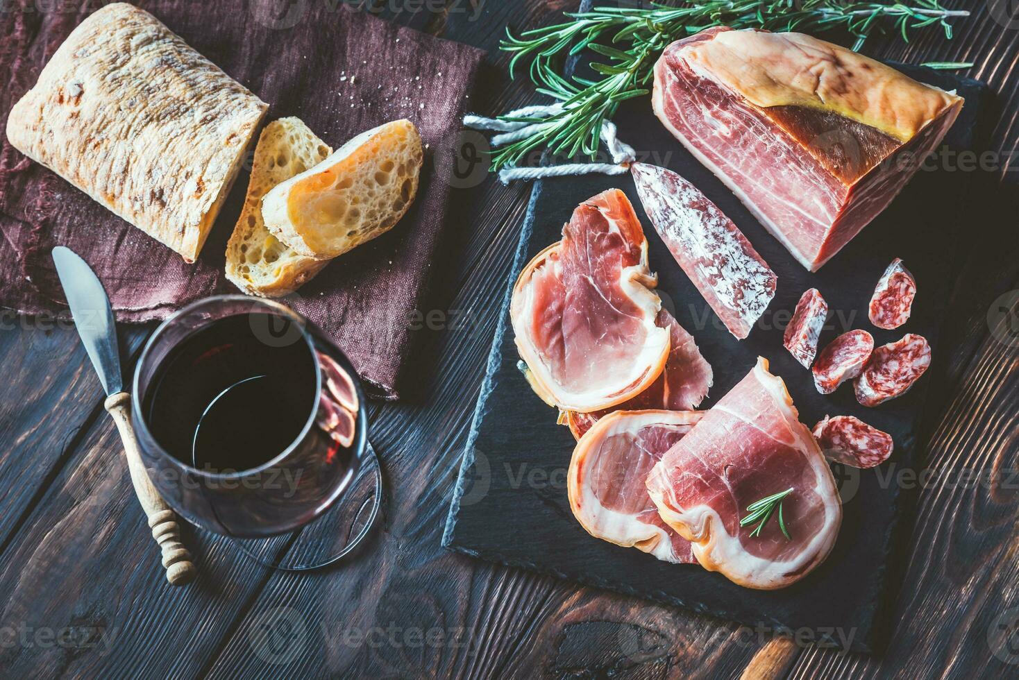 Red wine with prosciutto ham photo