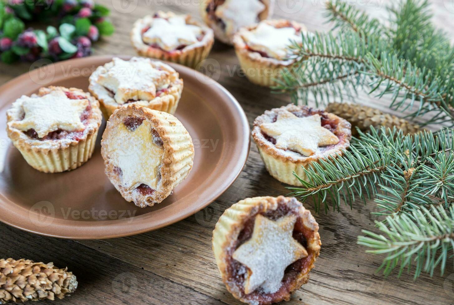 Mince pies with Christmas tree branch photo