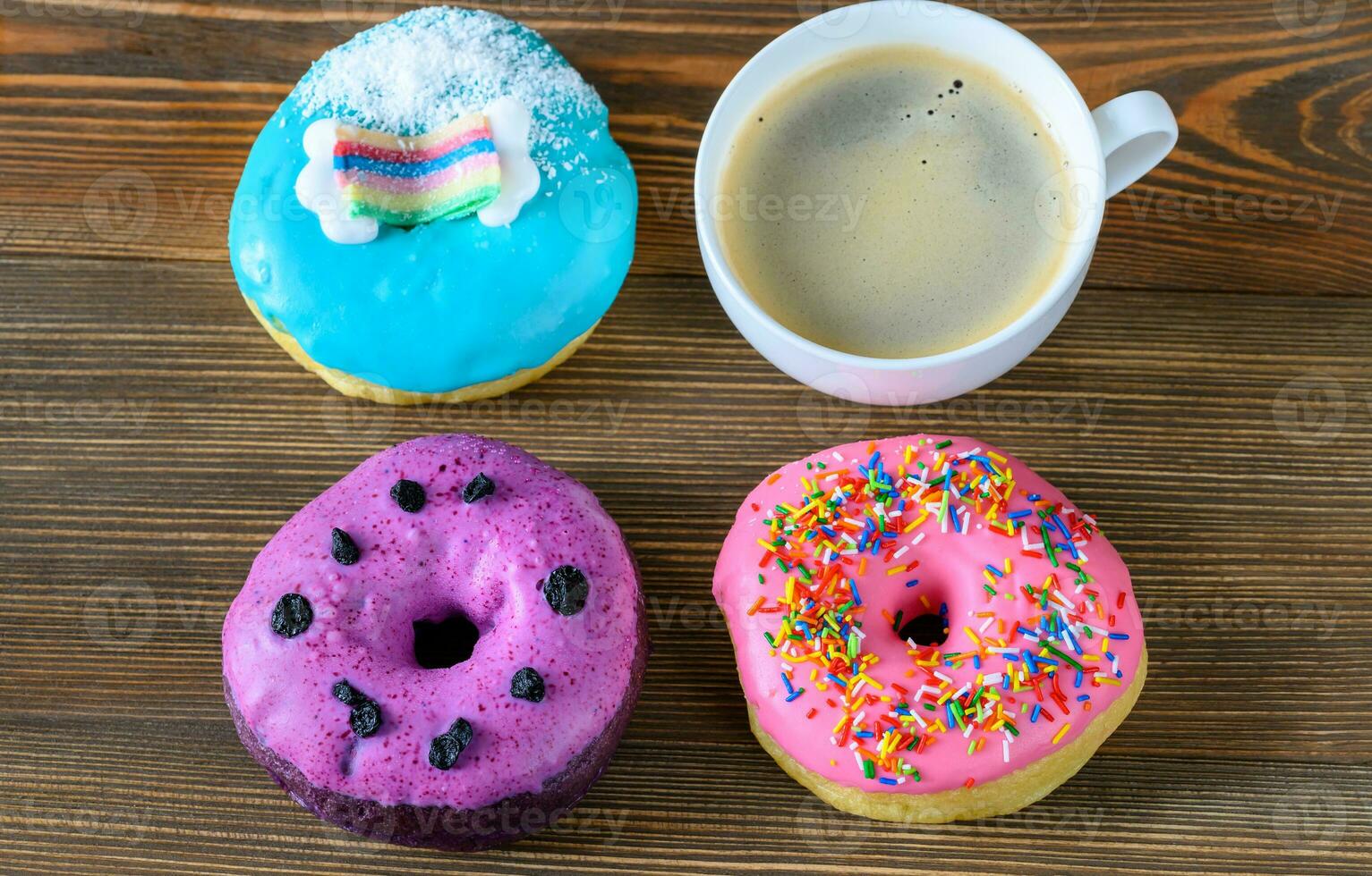 Donuts with a cup of coffee photo