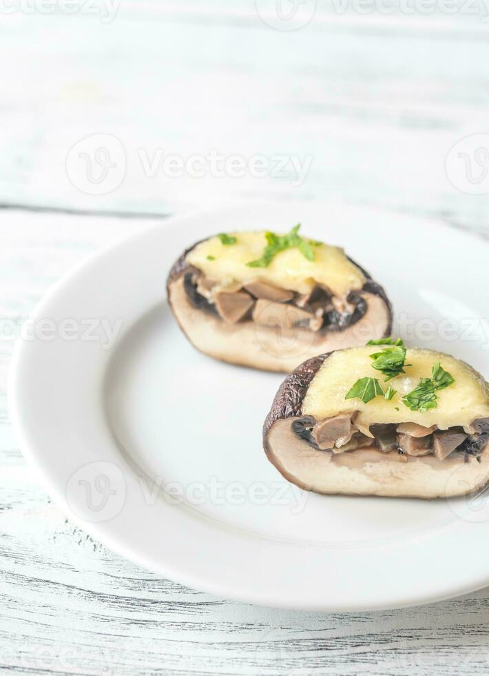 Baked mushroom stuffed with mozzarella photo