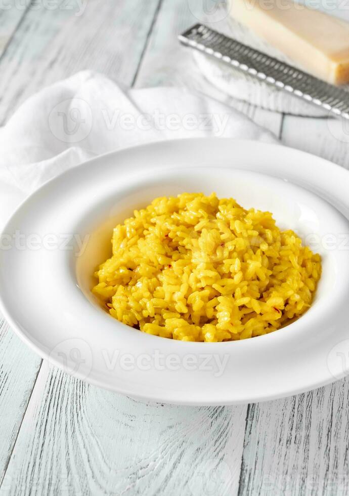 Portion of saffron risotto photo