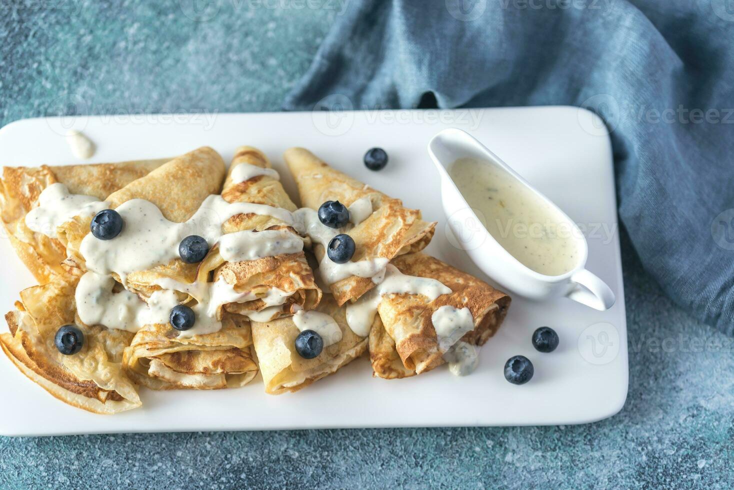 Crepes with blue cheese sauce photo