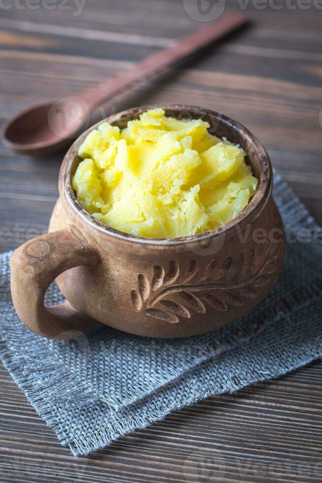 Bowl of ghee clarified butter photo