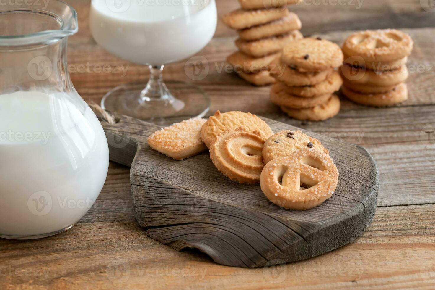 Butter cookies with jug of milk photo