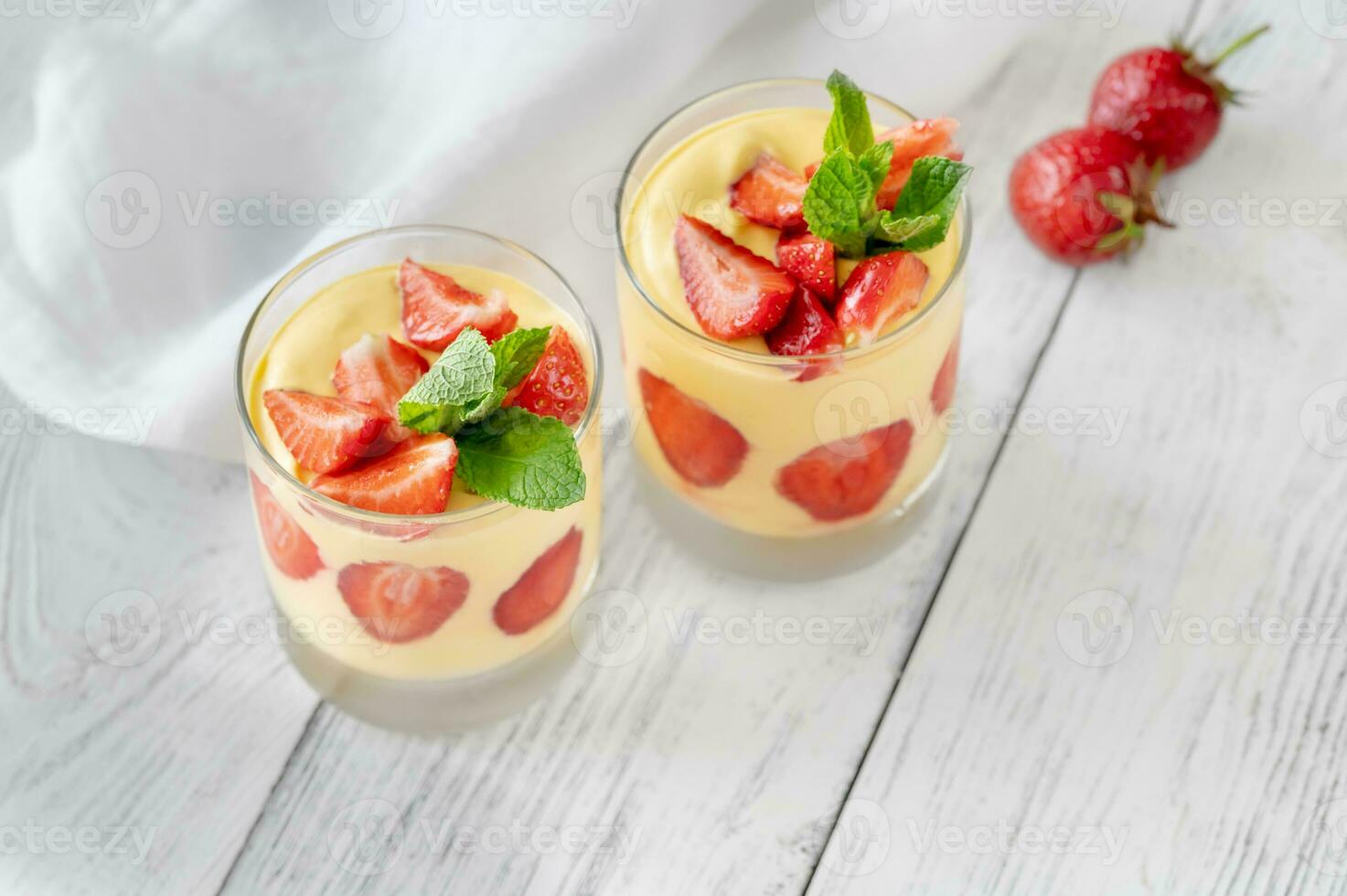 Mango custard with fresh strawberry photo