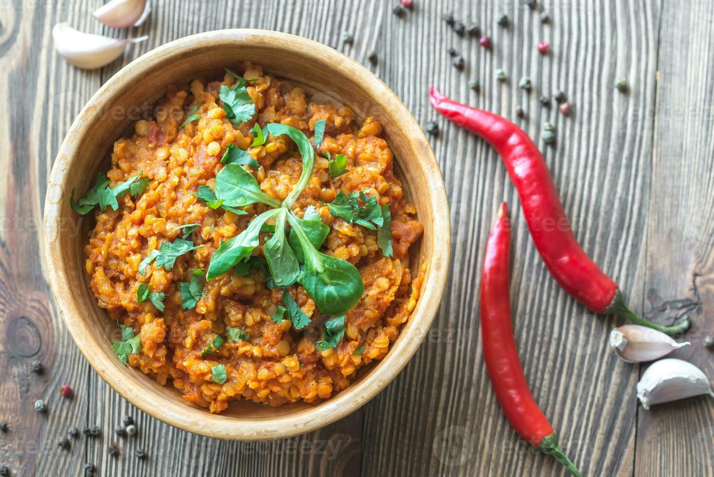 Bowl of red lentil curry photo
