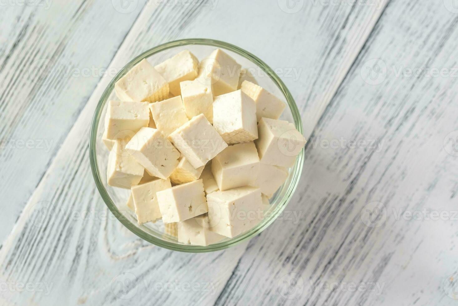 Cut tofu in the glass bowl photo