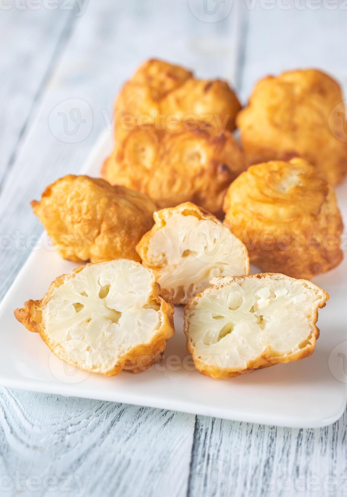 Fried cauliflower coated in batter 24217081 Stock Photo at Vecteezy