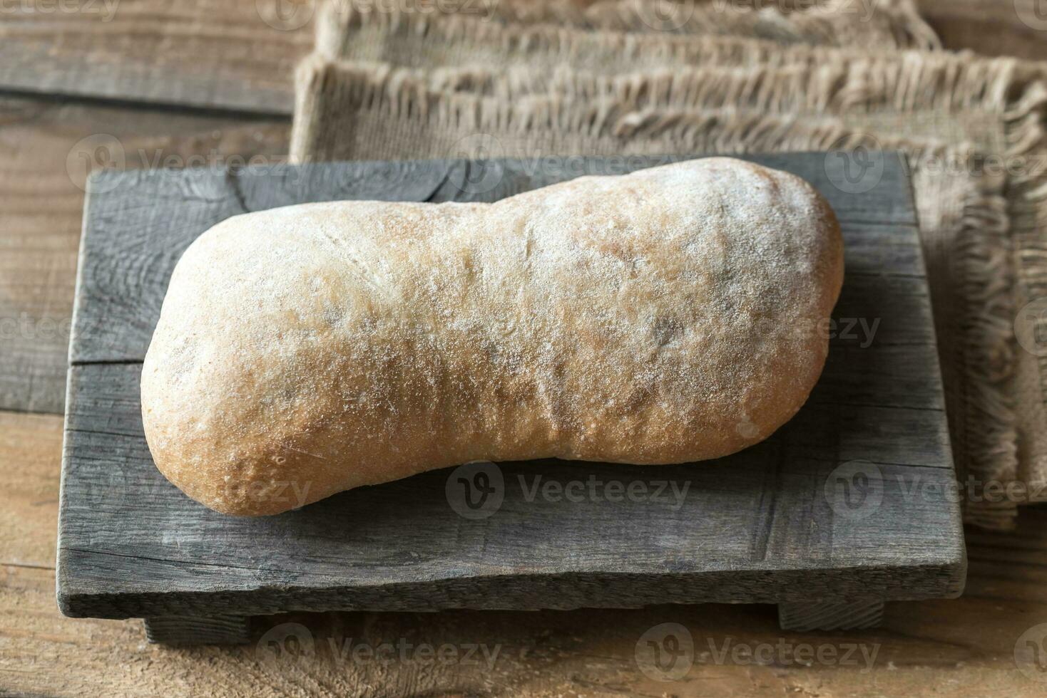 Ciabatta on the wooden board photo