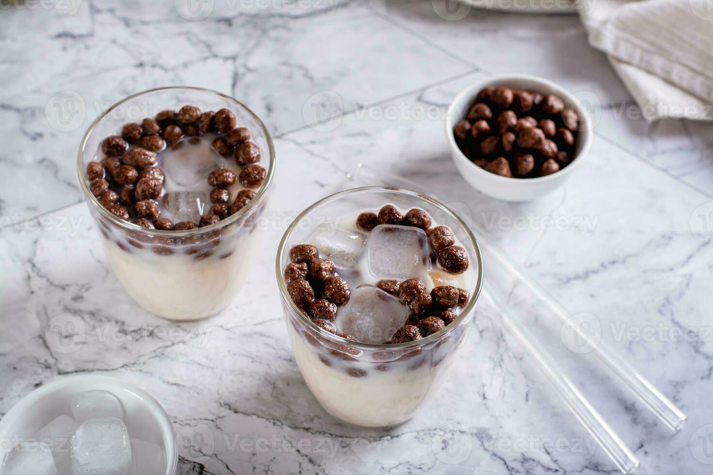 Homemade milk bubble tea with ice in glasses on the table photo