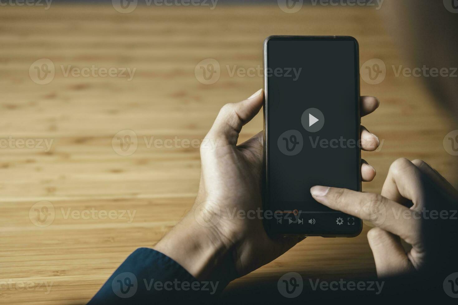 the man touching play icon on video online. video content creator concept. photo
