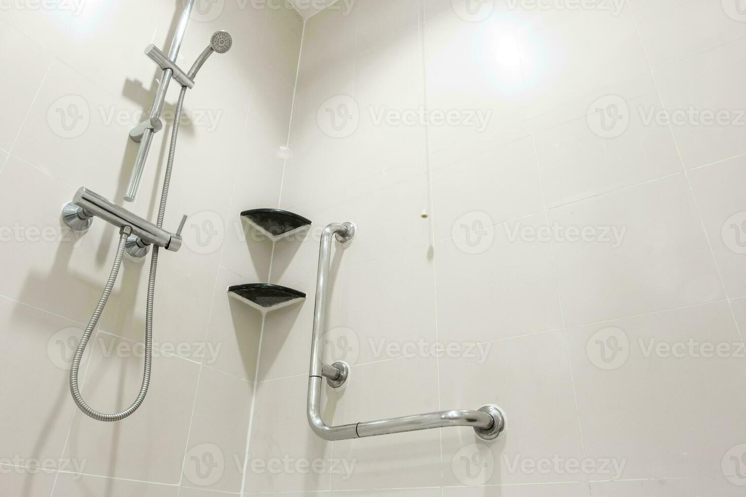 Toilet shower and handrail for elderly people at the bathroom in hospital, safty and medical concept photo