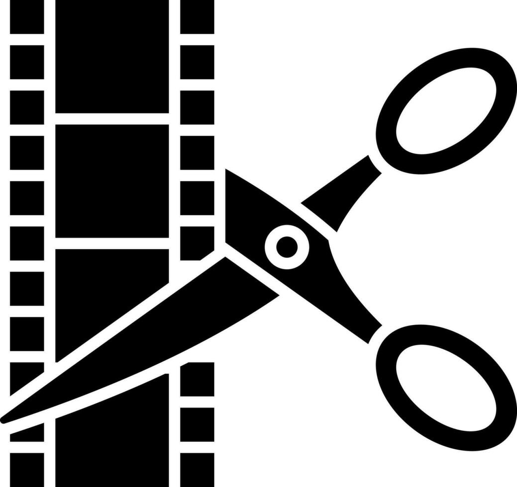 Glyph film strip with scissors icon or symbol. vector