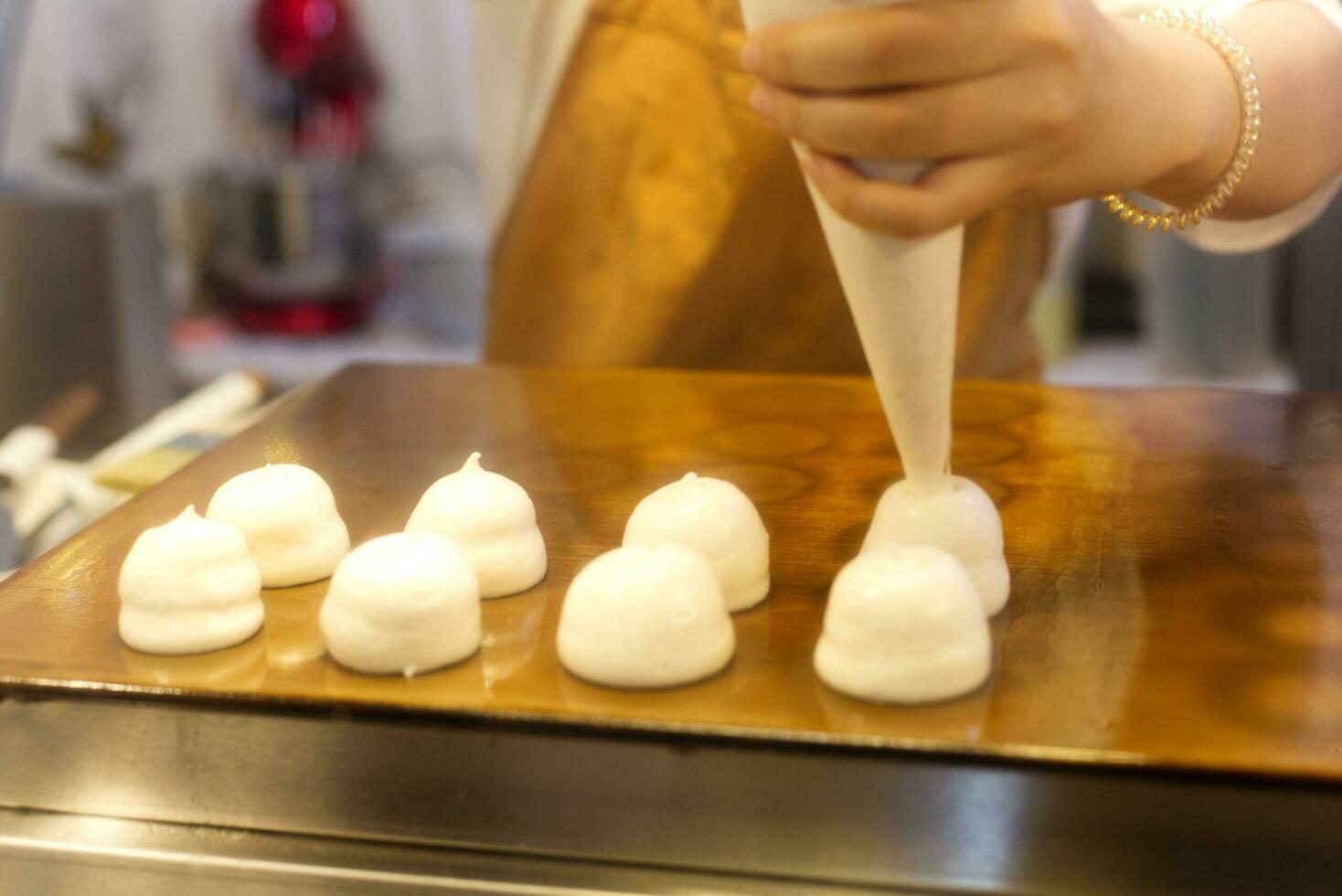 making cooking fluffy mini pancake on hot pan plate photo