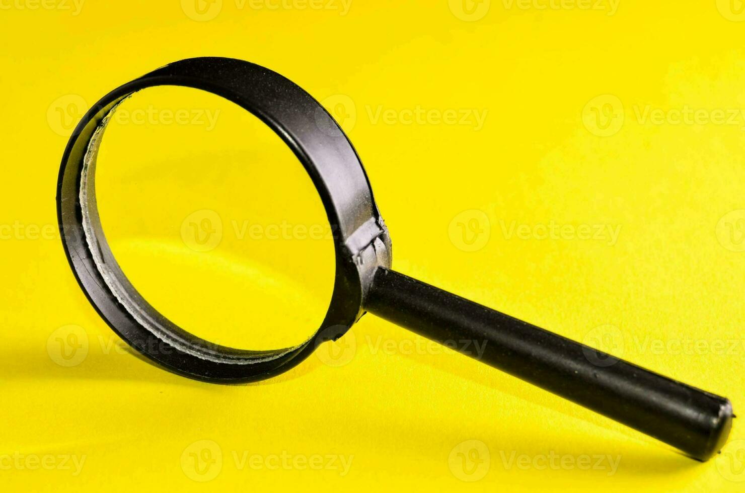 Isolated magnifying glass photo