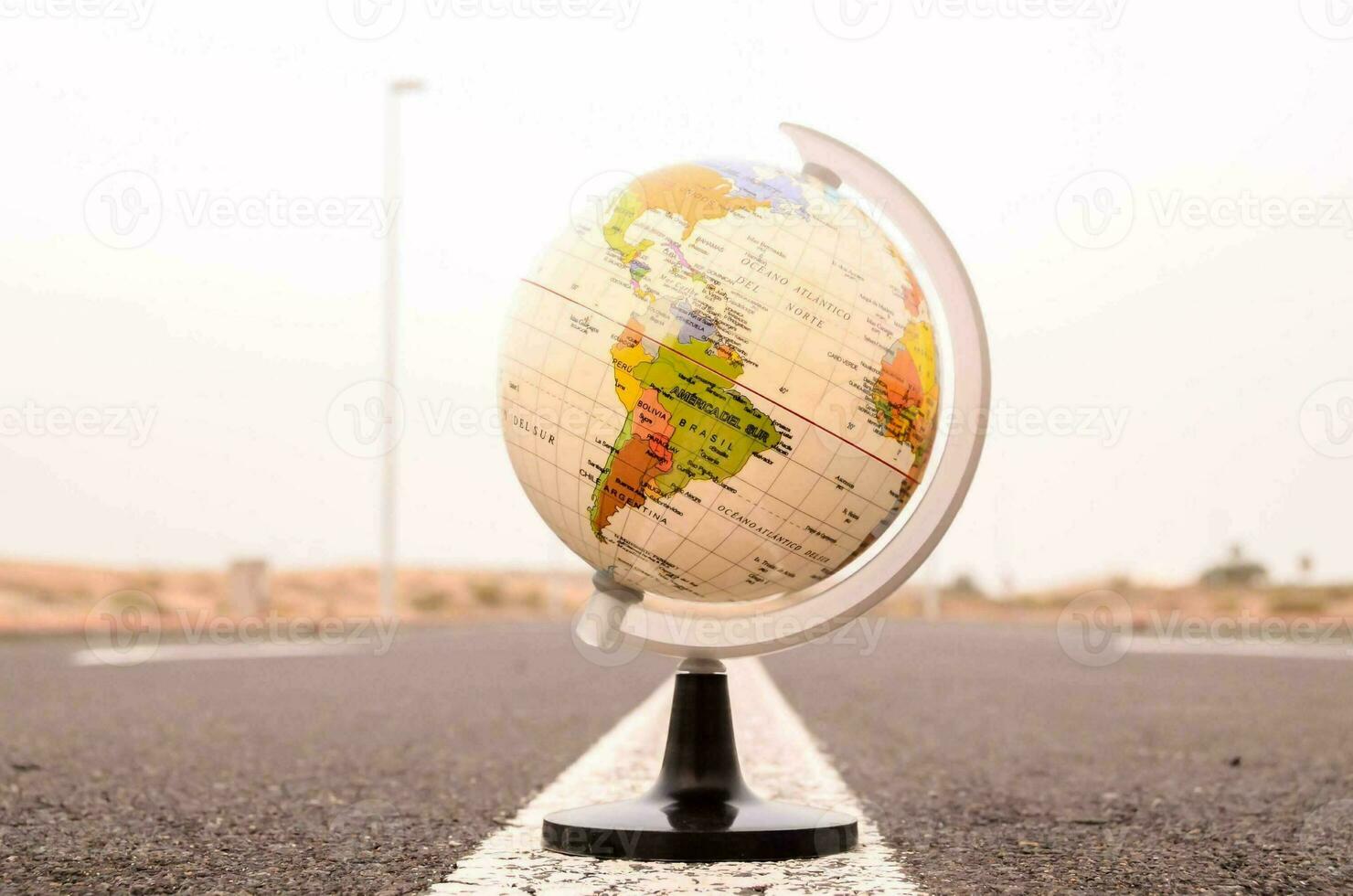 Globe on the ground photo