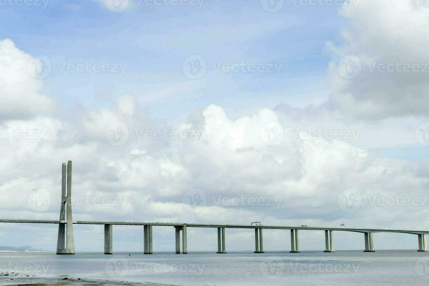 View with bridge by the sea photo