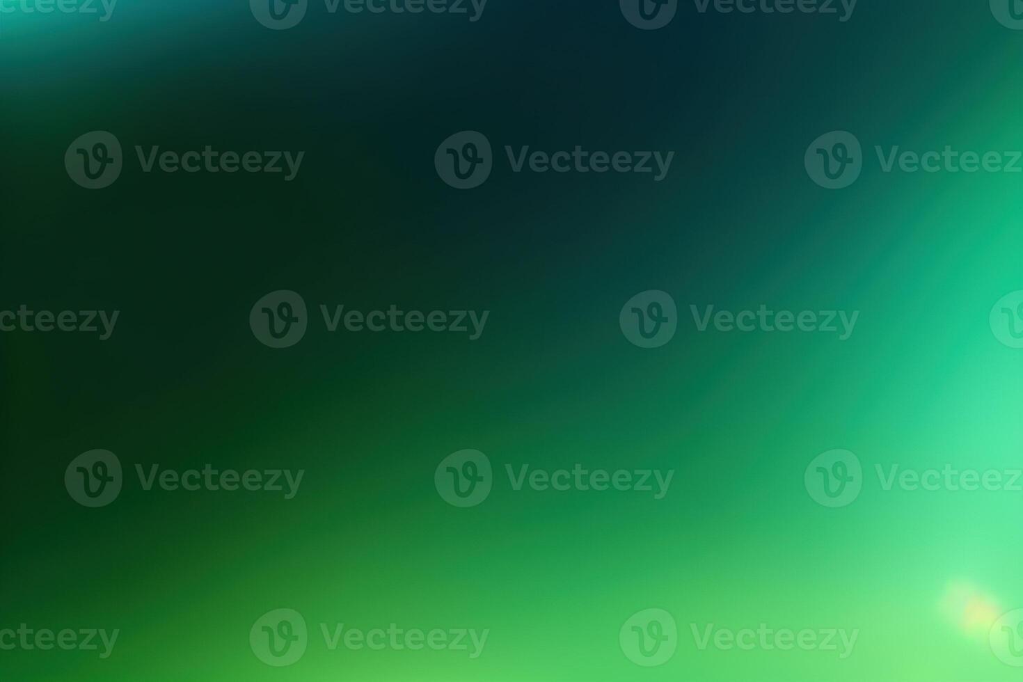 green abstract background with beautiful bokeh and rays of light. photo