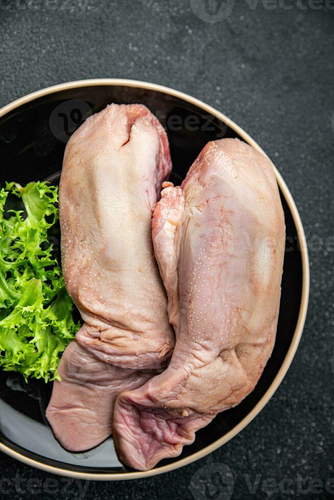 tongue pork raw meat meal food snack on the table copy space food background rustic top view photo
