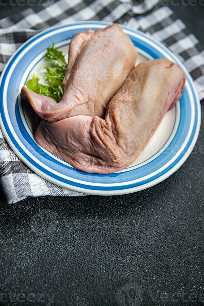 tongue pork raw meat meal food snack on the table copy space food background rustic top view photo