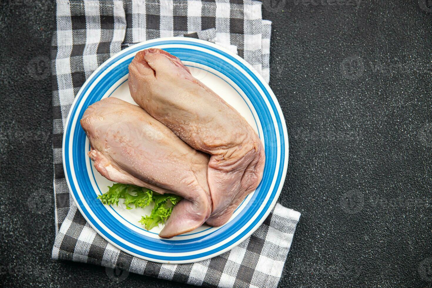 tongue pork raw meat meal food snack on the table copy space food background rustic top view photo