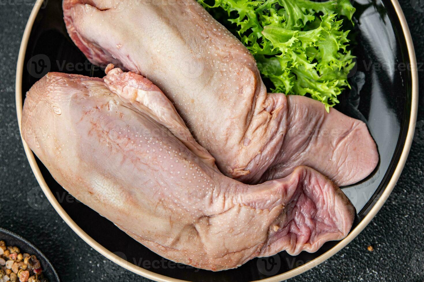 tongue pork raw meat meal food snack on the table copy space food background rustic top view photo