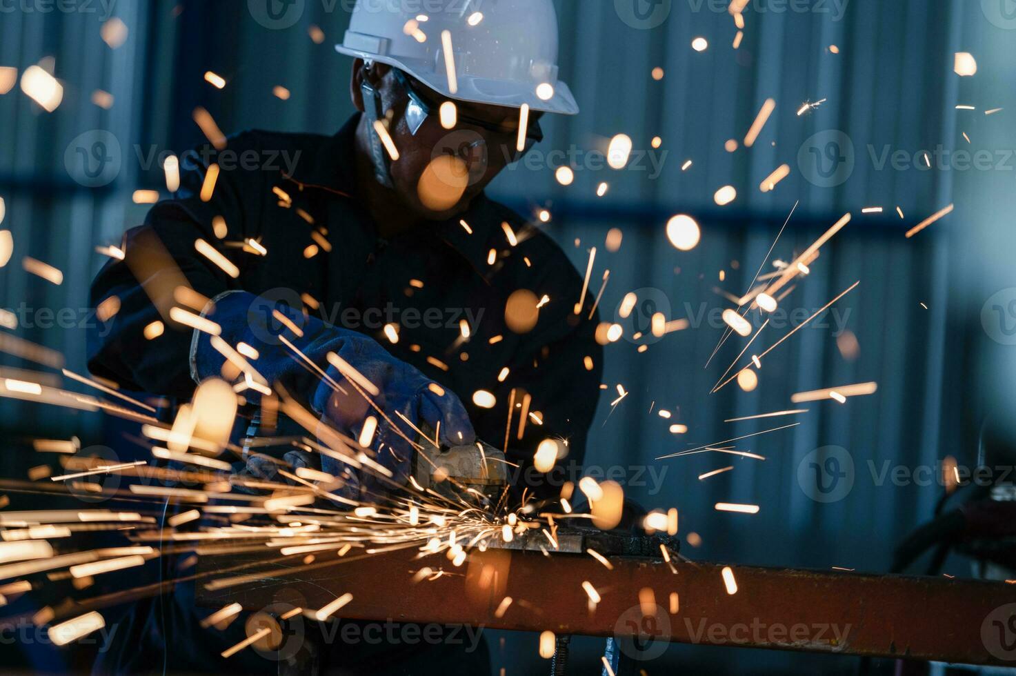 angle grinder for grinding Metal processing with an angle grinder sparks in metal photo