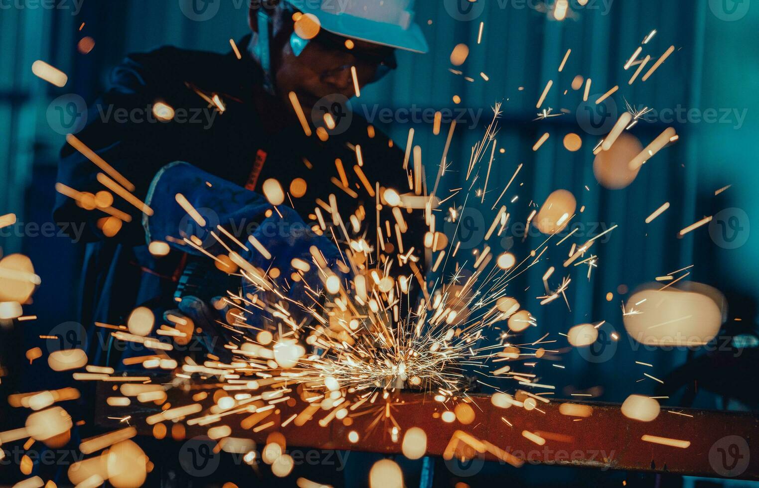 angle grinder for grinding Metal processing with an angle grinder sparks in metal photo