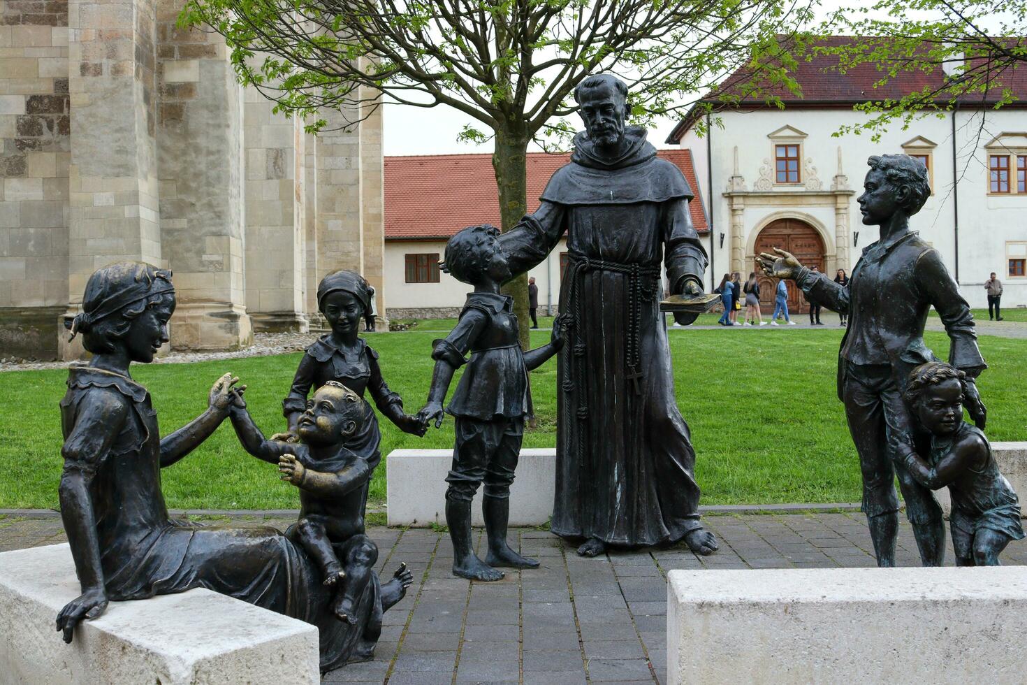 Alba Iulia , Romania - May 1 2023 , The multitude of statues made of bronze that can be found near the center of the fortress.This statues present different status of the people back days photo