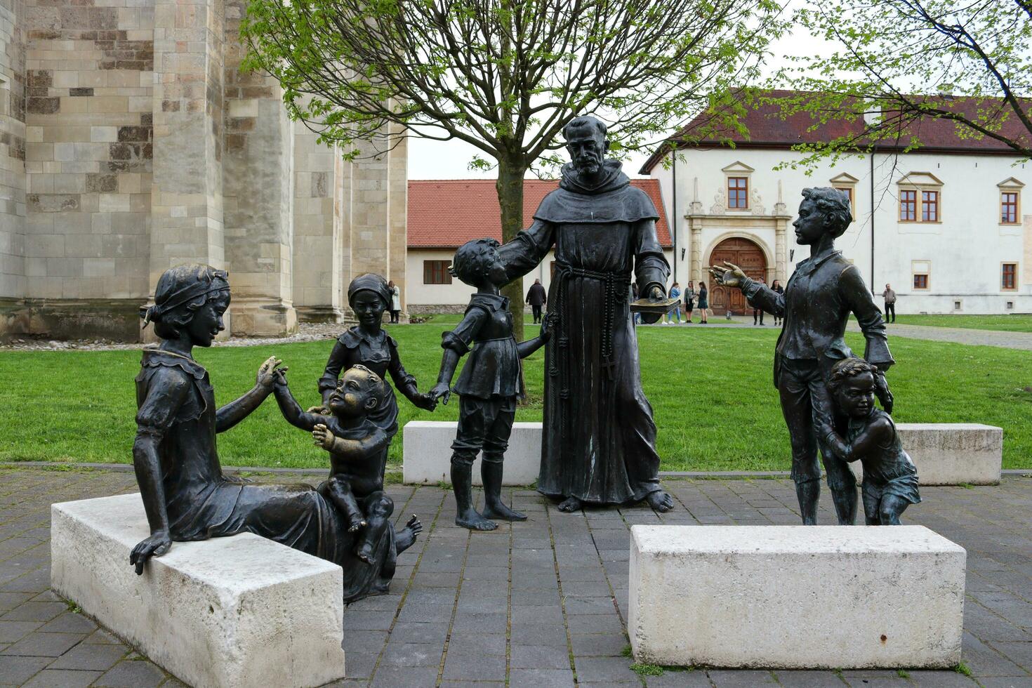 Alba Iulia , Romania - May 1 2023 , The multitude of statues made of bronze that can be found near the center of the fortress.This statues present different status of the people back days photo