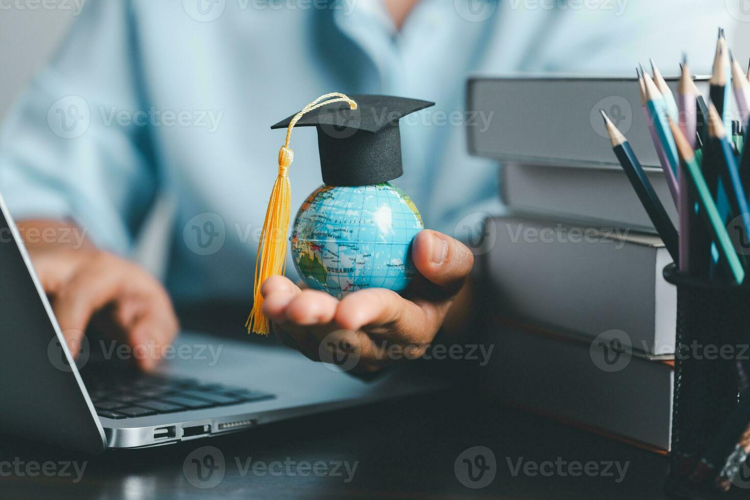 Graduation cap with Earth globe. Concept of global business study, abroad educational, Back to School. Education in Global world, Study abroad business in universities in worldwide. language study photo