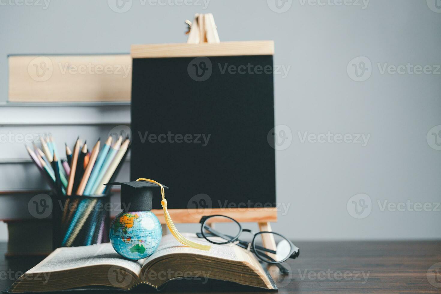 Graduation cap with Earth globe. Concept of global business study, abroad educational, Back to School. Education in Global world, Study abroad business in universities in worldwide. language study photo