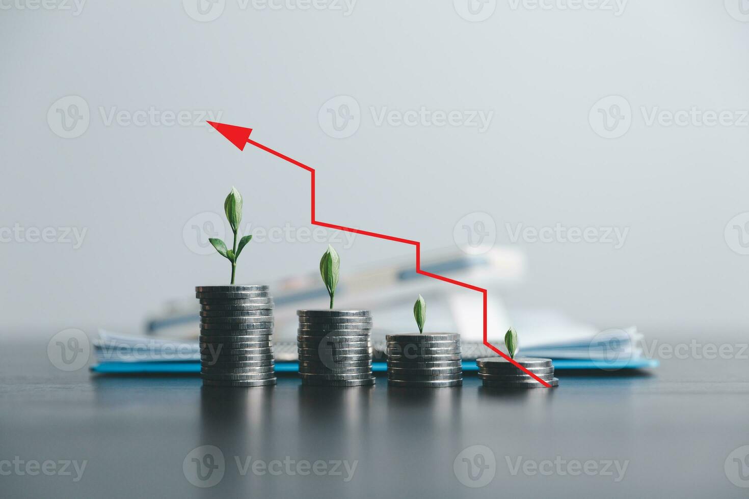 Save money, success goals and investment growth concept. Tree growing on stack coins with arrows rising on blur office background. Financial and business, Management money retire, tax. photo